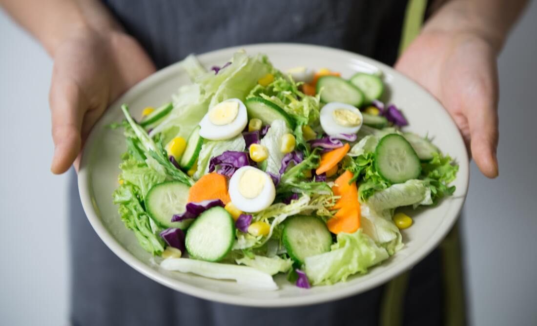 delicious salad with egg and cucumber