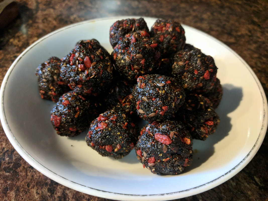 Poppy seed dessert with gogi berries